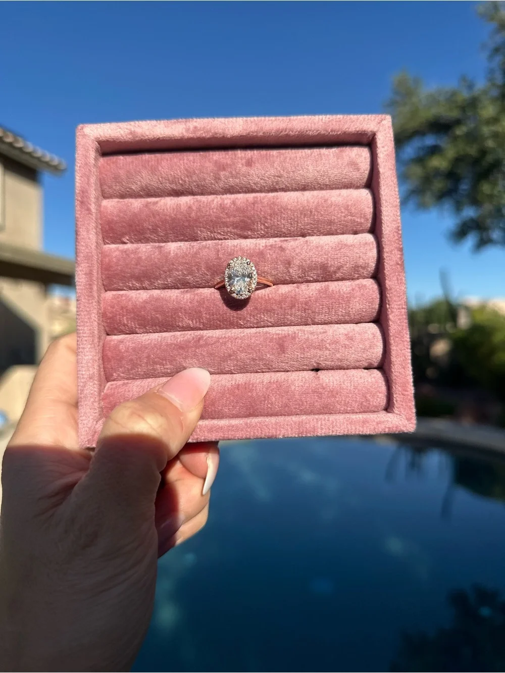 Oval lab diamond ring 2 carats size 7.5set in 14kt rose gold comes w paperwork